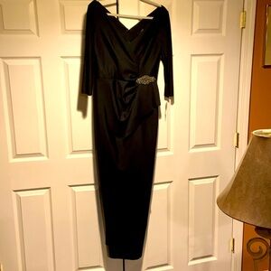 New with tags gorgeous Alex Evenings formal dress size 12. Black Scuba material